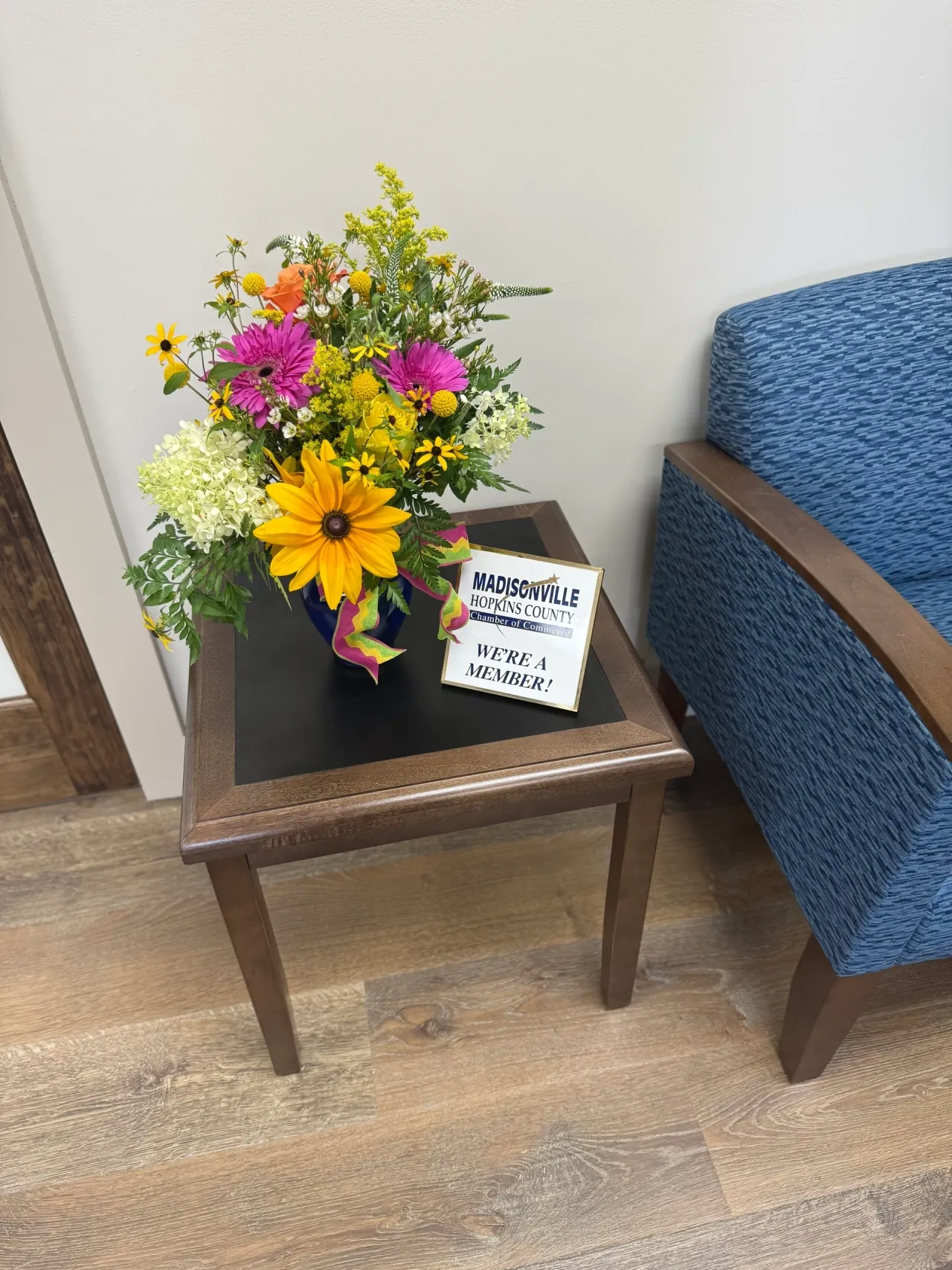 Flower bouquet on wooden table