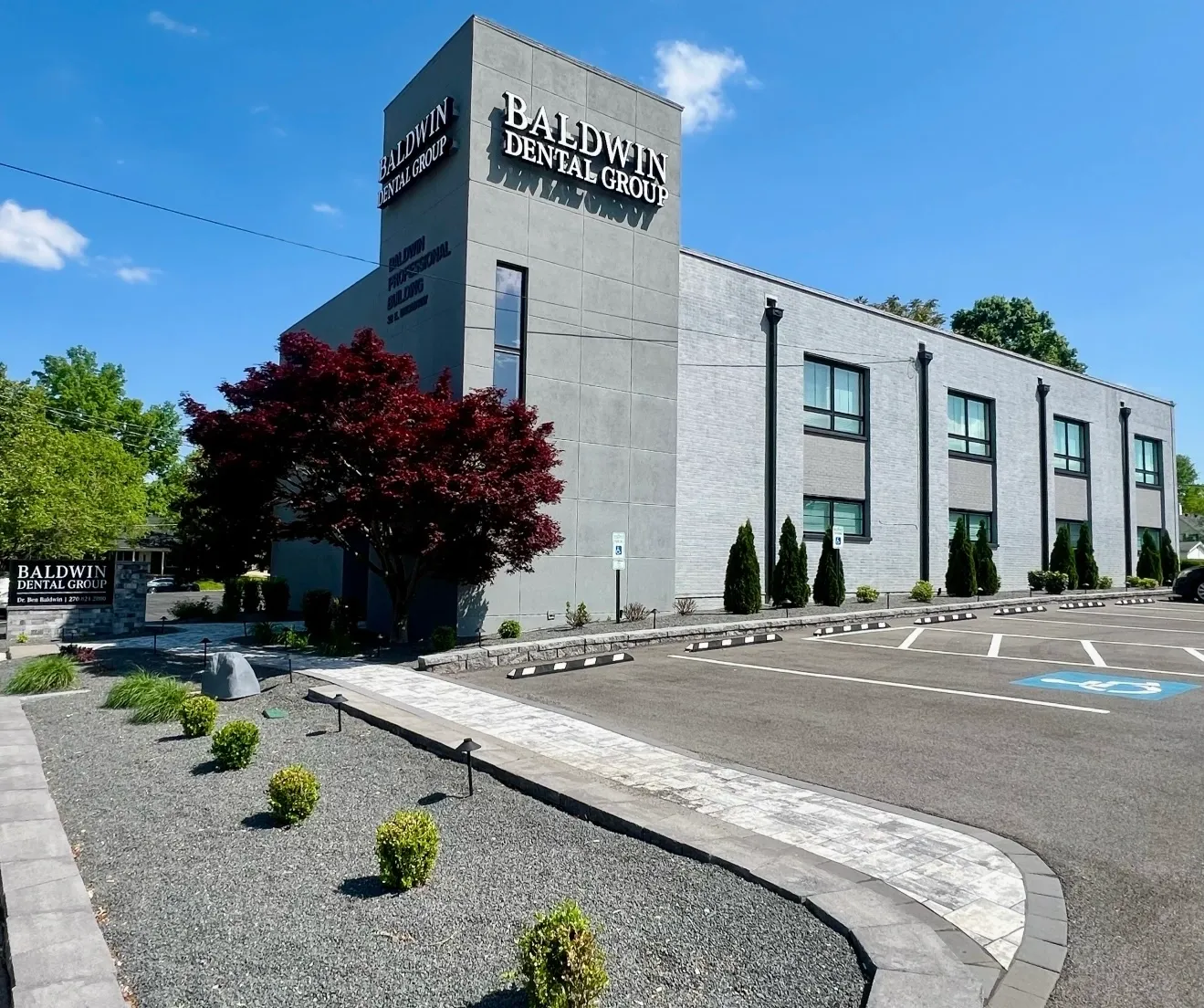 Contemporary dental practice with garden landscaping