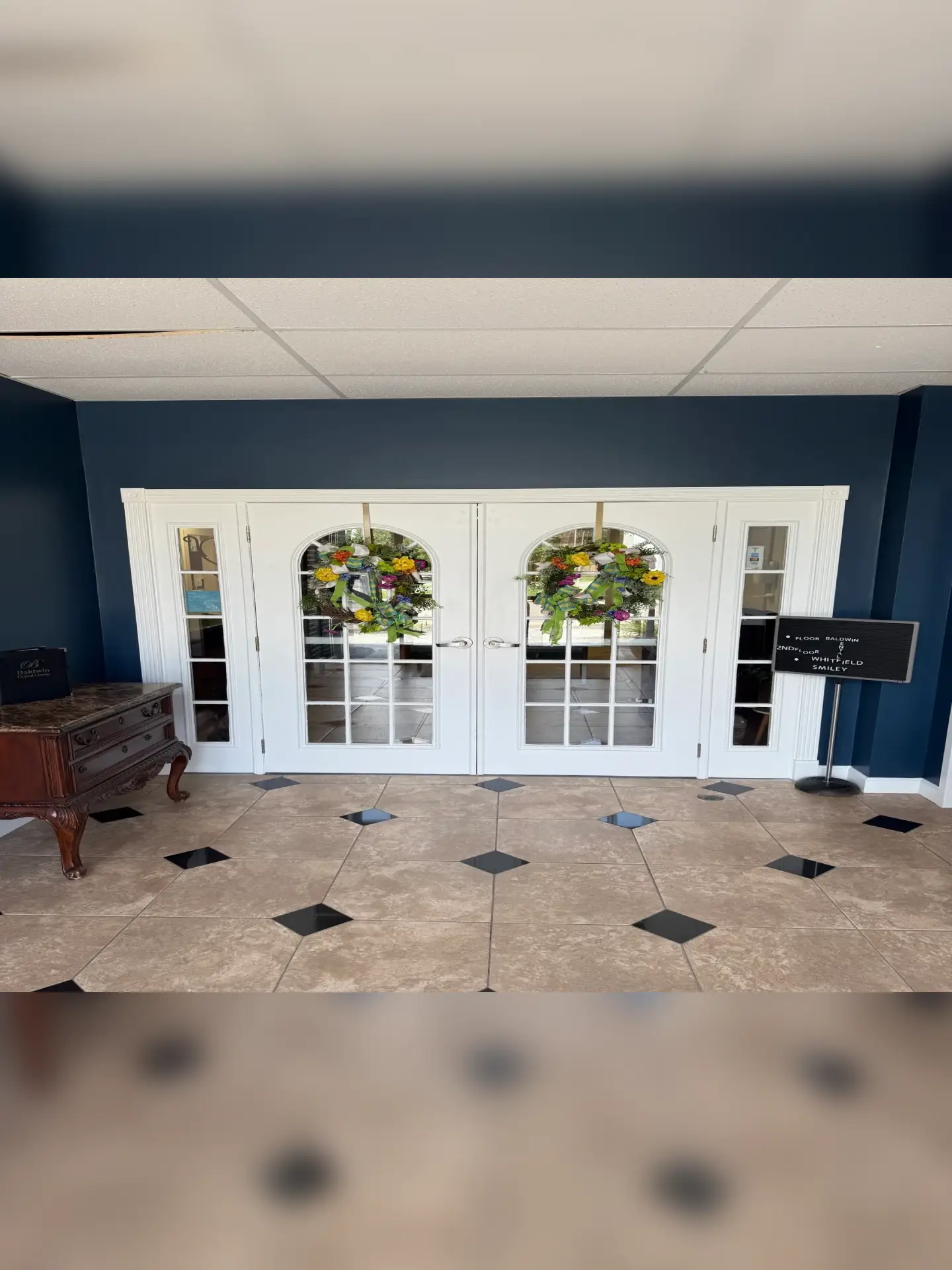 Blue walls and decorative glass doors
